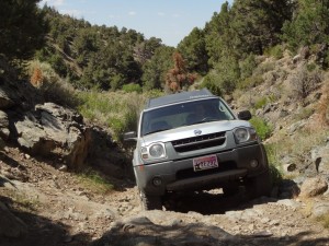 Drive it like Grandma. Trying to spin the tires through this will only net you a long walk and box full of broken parts, not to mention tearing the trail up.